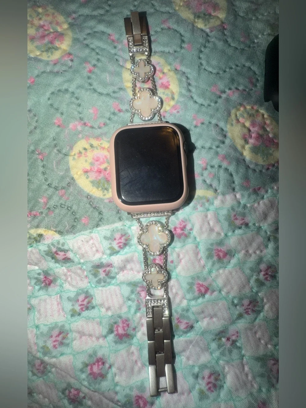 Silver Smartwatch with Multiple Colored Protective Cases and Charger